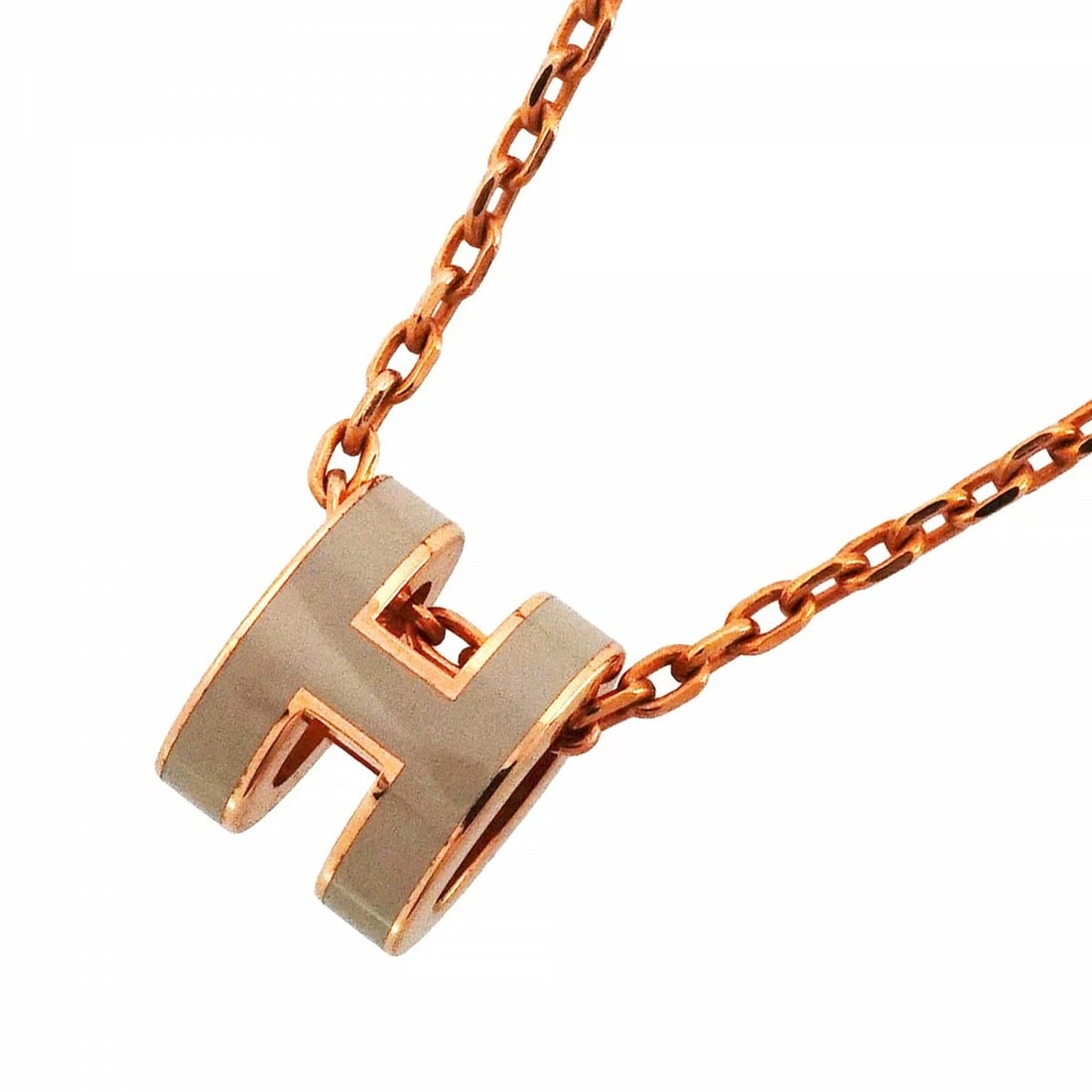 HERMES MINI POP H NECKLACE GRAY PINK GOLD GP PLATED: Hermes Mini Pop H Necklace Gray Pink Gold GP Plated Brand: Hermes Type/Style: Necklace Material: GP plating Color: Gray, Pink Gold Size: The chain measures approximately 15.7 inches, with the pendant 