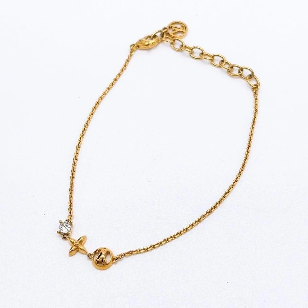 LOUIS VUITTON PETIT LOUIS BRACELET: Louis Vuitton Petit Louis Bracelet Brand: Louis Vuitton Type/Style: Bracelet Material: Leather Color: Gold tone Size: 20cm wrist circumference. Accessories: None Accessories Notice: When p