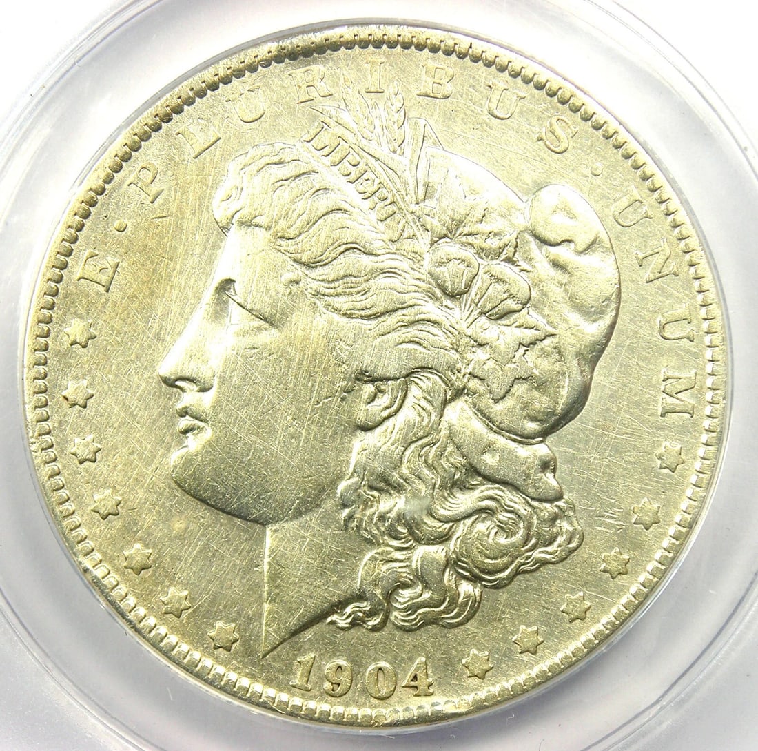 1904-S MORGAN SILVER DOLLAR $1 COIN: 1904-S Morgan Silver Dollar $1 Coin Year : 1904 Denomination : $1 Country of Origin : United States Accessories: None Accessories Notice: When purchasing pre-owned goods, please refer to the photos of