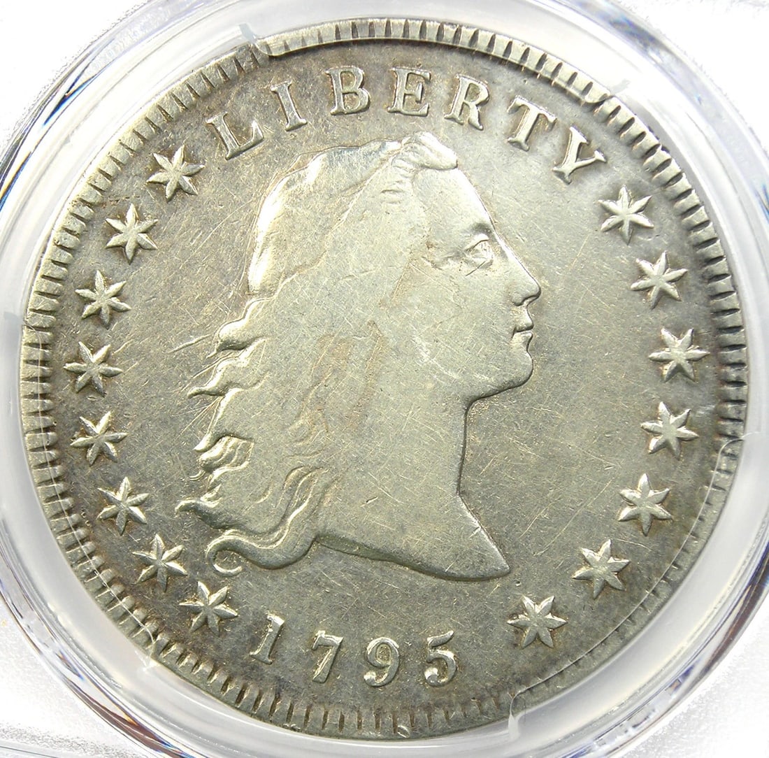 1795 FLOWING HAIR SILVER DOLLAR $1 COIN: 1795 Flowing Hair Silver Dollar $1 Coin Year : 1795 Denomination : $1 Country of Origin : United States Accessories: None Accessories Notice: When purchasing pre-owned goods, please refer to the photo