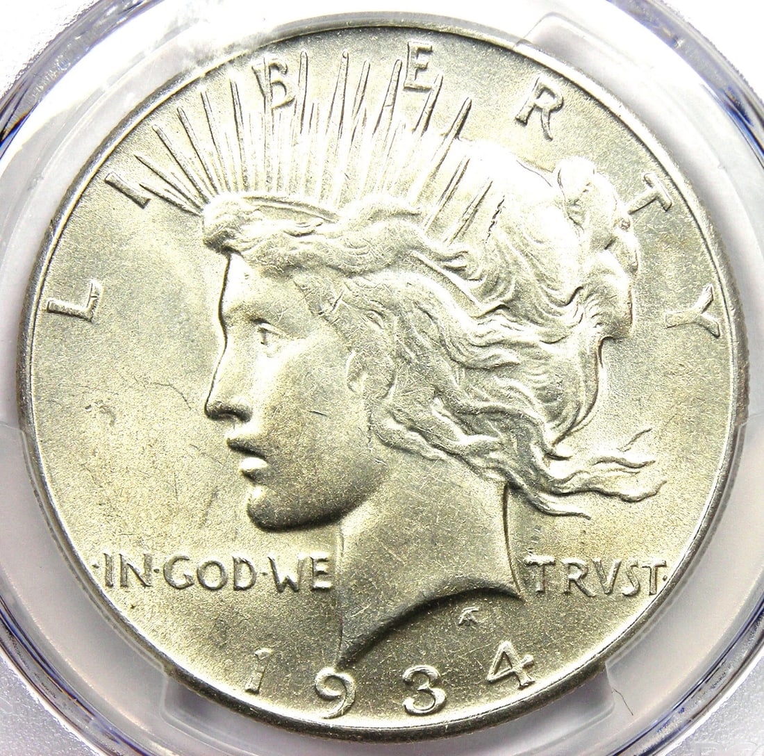 1934-S PEACE SILVER DOLLAR $1 COIN: 1934-S Peace Silver Dollar $1 Coin Year : 1934 Denomination : $1 Country of Origin : United States Accessories: None Accessories Notice: When purchasing pre-owned goods, please refer to the photos of 