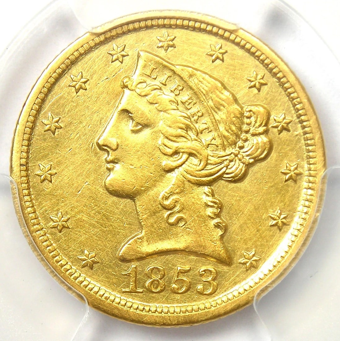 1853-D LIBERTY GOLD HALF EAGLE $5 GOLD COIN: 1853-D Liberty Gold Half Eagle $5 Gold Coin Year : 1853 Denomination : $5 Country of Origin : United States Accessories: None Accessories Notice: When purchasing pre-owned goods, please refer to the p