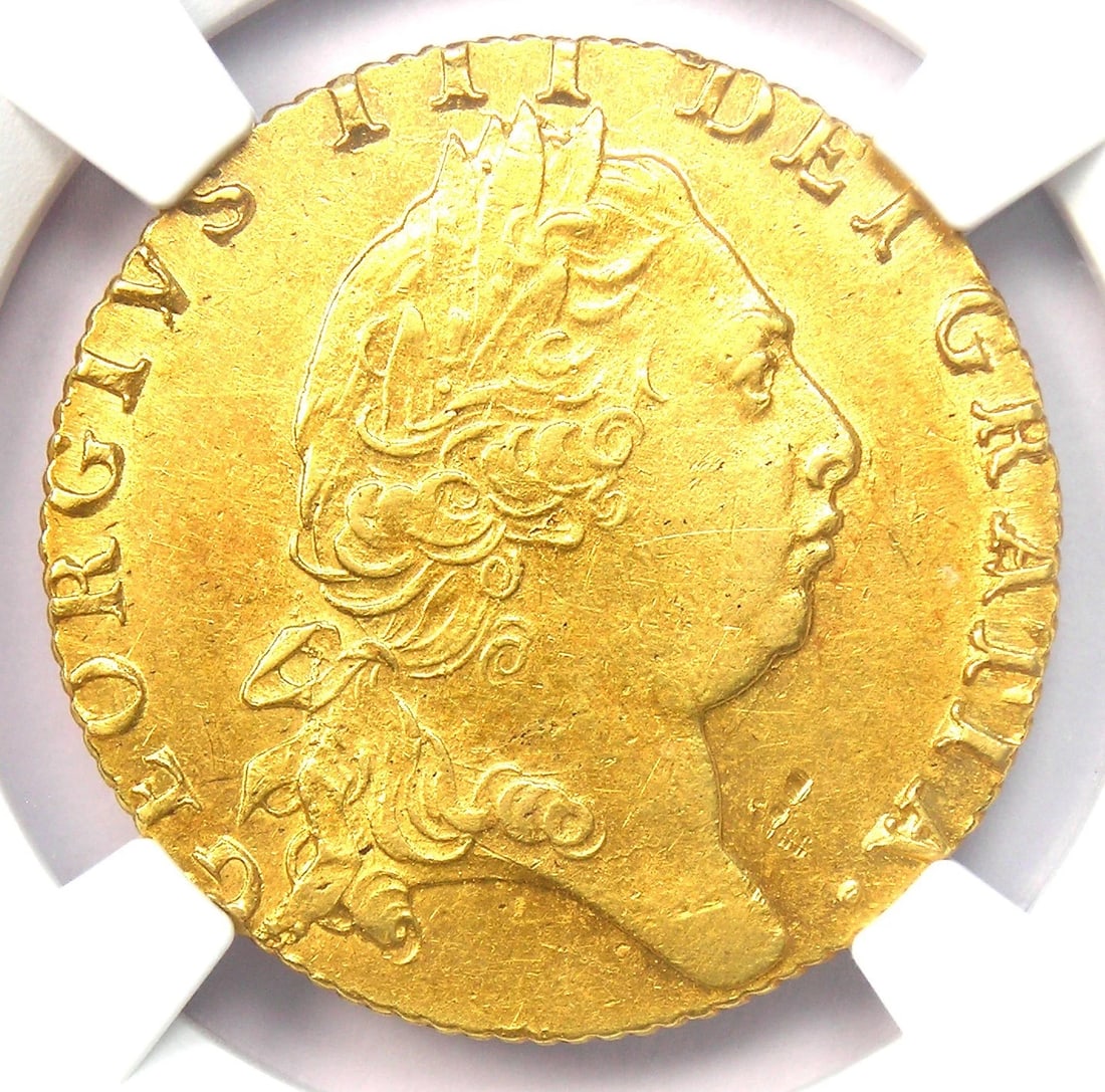 1799 BRITAIN ENGLAND GEORGE III GOLD GUINEA COIN: 1799 Britain England George III Gold Guinea Coin Year : 1799 Denomination : Guinea Country of Origin : United Kingdom Accessories: None Accessories Notice: When purchasing pre-owned goods, please refe