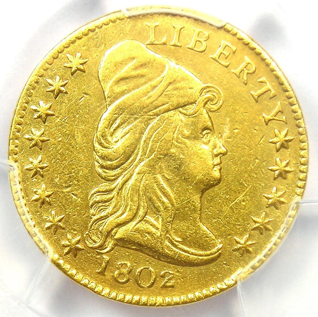 1802/1 CAPPED BUST GOLD QUARTER EAGLE $2.50 COIN: 1802/1 Capped Bust Gold Quarter Eagle $2.50 Coin Year : 1802 Denomination : $2.50 Country of Origin : United States Accessories: None Accessories Notice: When purchasing pre-owned goods, please refer