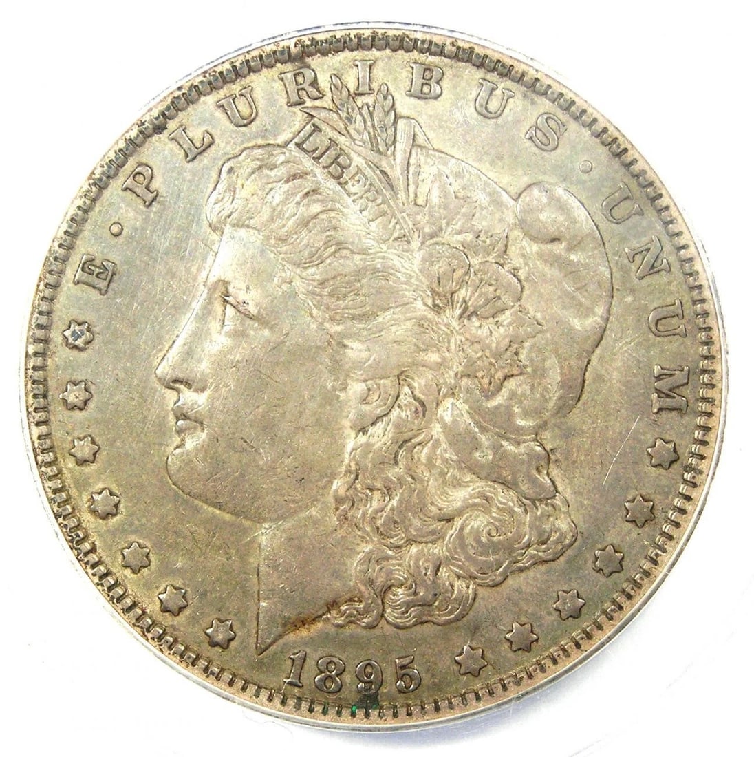 1895-O MORGAN SILVER DOLLAR $1 COIN: 1895-O Morgan Silver Dollar $1 Coin Year : 1895 Denomination : $1 Country of Origin : United States Accessories: None Accessories Notice: When purchasing pre-owned goods, please refer to the photos of