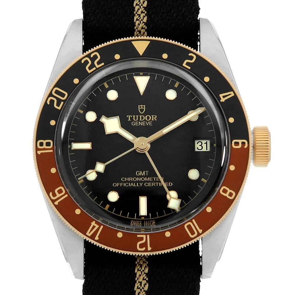 TUDOR HERITAGE BLACK STAINLESS STEEL WATCH: TUDOR Heritage Black Stainless Steel watch Brand: TUDOR Type/Style: Wrist watch Material: Band Material fabric, Case Material Stainless Steel/Yellow Gold Color: Dial Color Black Size: Case:W41mm A