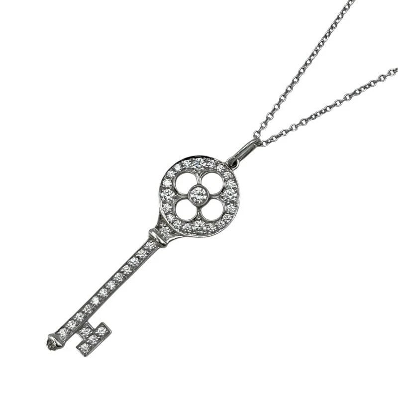 TIFFANY & CO. CLOVER KEY NECKLACE WHITE GOLD/PLATINUM: Tiffany & Co. Clover Key Necklace White Gold/Platinum Brand: Tiffany & Co. Type/Style: Necklace Material: 18K WG Pt950, Color: WG PT Size: Size Height: approx. 37.2mm Width: approx. 11.7mm Chain lengt