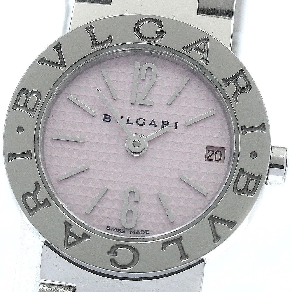 BVLGARI DATE PINK DIAL QUARTZ WATCH: BVLGARI Date pink Dial Quartz Watch Brand: BVLGARI Type/Style: Wristwatch Material: Band Material Stainless Steel, Case Material Stainless Steel Color: Dial Color pink Size: Case Size About23mm