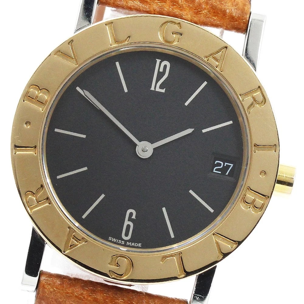 BVLGARI YG BEZEL DATE QUARTZ WATCH: BVLGARI YG bezel Date Quartz Watch Brand: BVLGARI Type/Style: Wristwatch Material: Band Material leather, Case Material Stainless Steel/YG Color: Case Color Silver / Gold Band Color Brown Dial Color