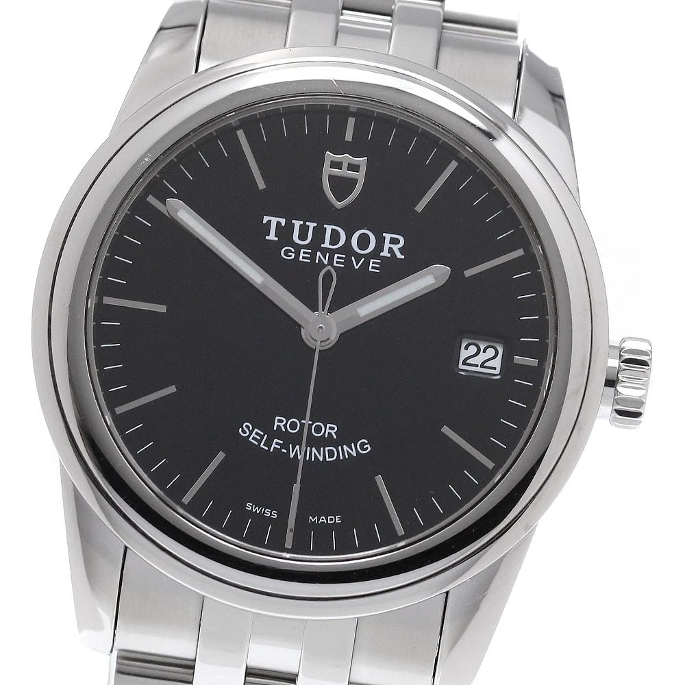 TUDOR GLAMOUR DATE BLACK AUTOMATIC WATCH: TUDOR Glamour Date black Automatic Watch Brand: TUDOR Type/Style: Wristwatch Material: Band Material Stainless Steel, Case Material Stainless Steel Color: Case Color Silver Band Color Silver Dial