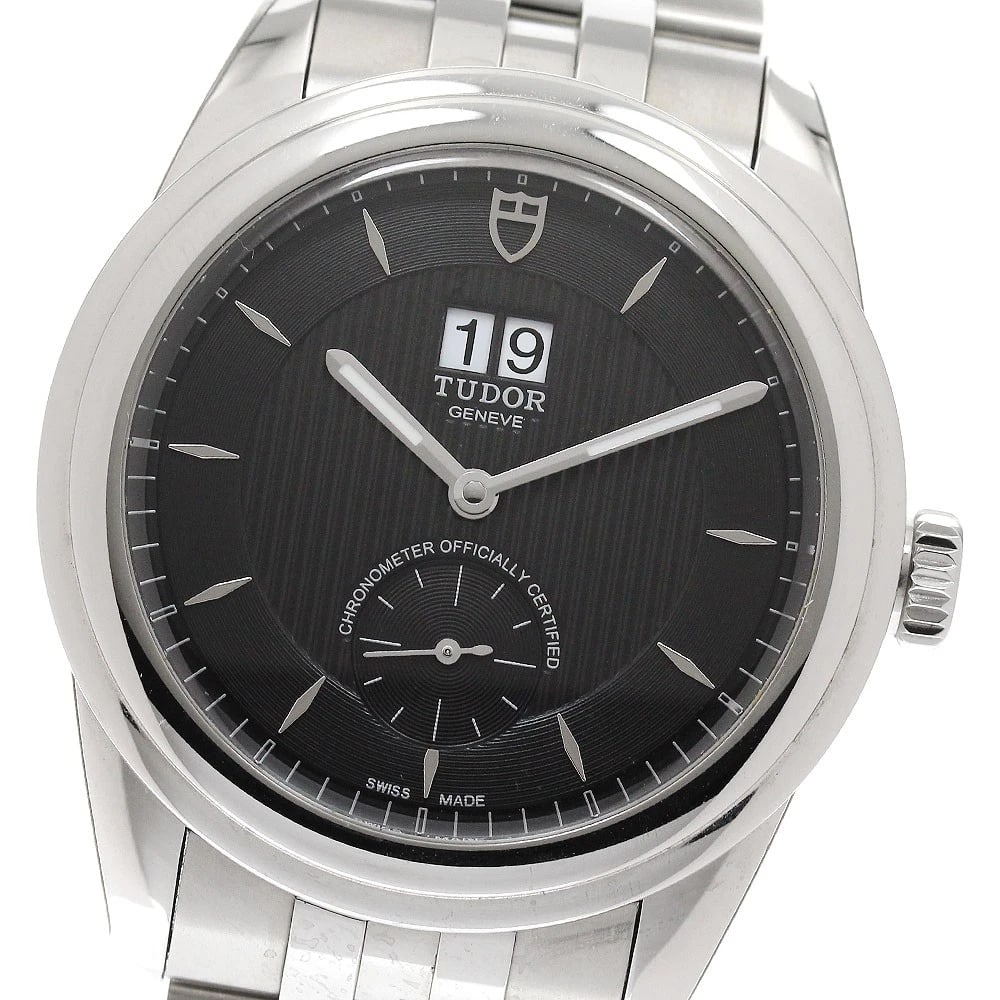 TUDOR GLAMOUR DATE BLACK AUTOMATIC WATCH: TUDOR Glamour date black Automatic Watch Brand: TUDOR Type/Style: Wristwatch Material: Band Material Stainless Steel, Case Material Stainless Steel Color: Dial Color black Size: Case size About 42mm