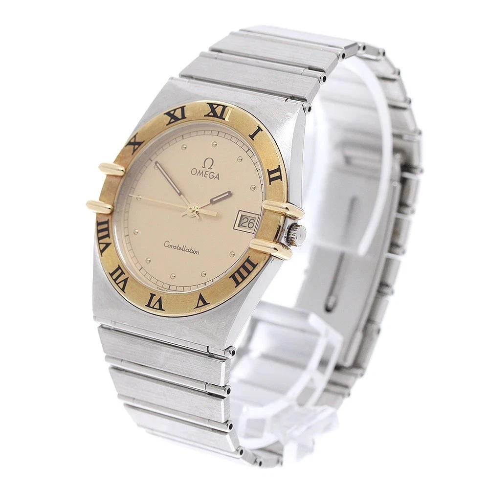 OMEGA CONSTELLATION DATE GOLD QUARTZ WATCH: OMEGA Constellation Date gold Quartz Watch Brand: OMEGA Type/Style: Wristwatch Material: Band Material Stainless Steel, Case Material Stainless Steel/YG Color: Dial Color gold Size: Case size About