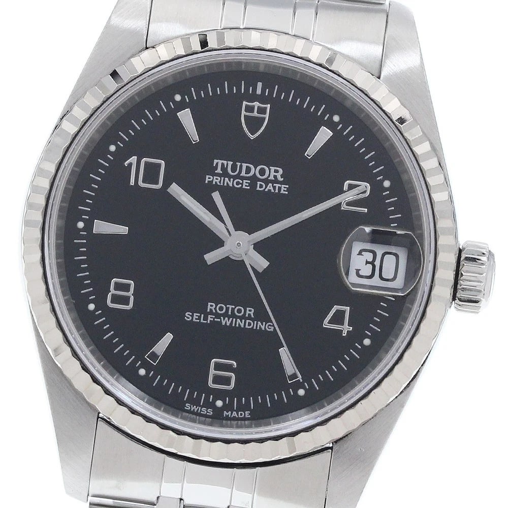 TUDOR PRINCE DATE WG BEZEL BLACK AUTOMATIC WATCH: TUDOR Prince Date WG bezel black Automatic Watch Brand: TUDOR Type/Style: Wristwatch Material: Band Material Stainless Steel, Case Material Stainless Steel/WG Color: Dial Color black Size: Case size