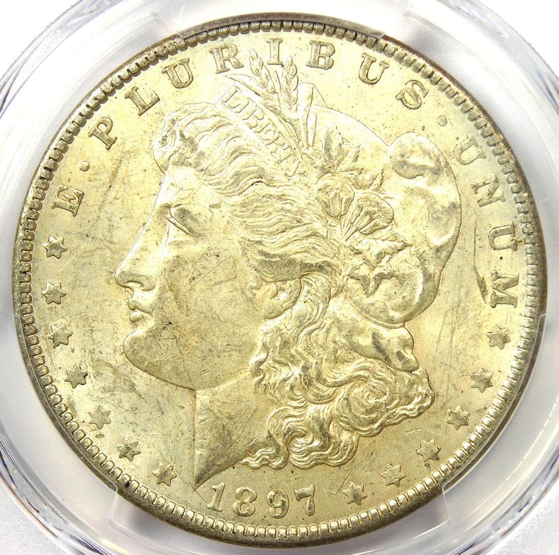 1897-O MORGAN SILVER DOLLAR $1 COIN: 1897-O Morgan Silver Dollar $1 Coin Year : 1897 Denomination : $1 Country of Origin : United States Accessories: None Accessories Notice: When purchasing pre-owned goods, please refer to the photos of