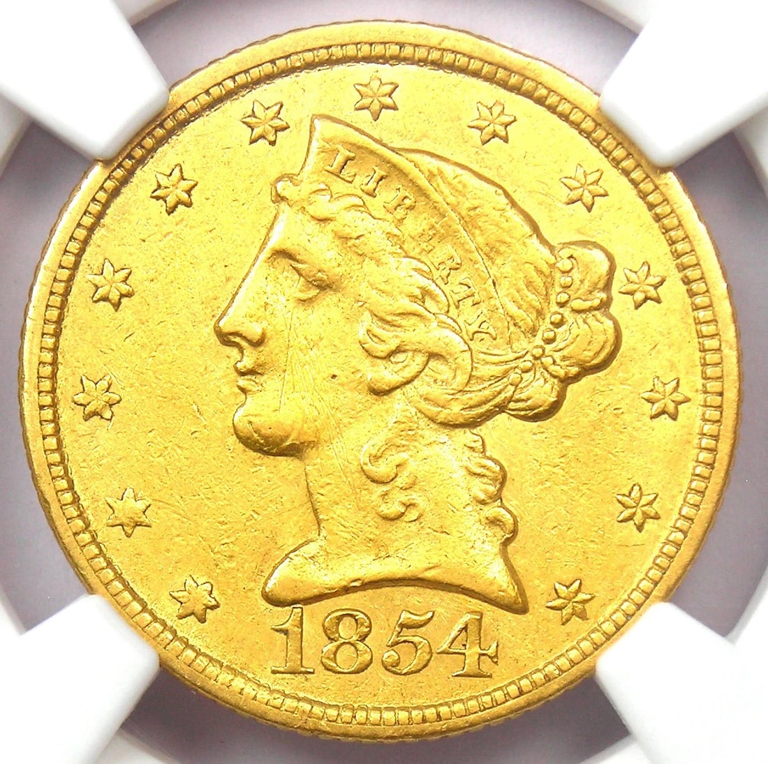 1854-C LIBERTY GOLD HALF EAGLE $5: 1854-C Liberty Gold Half Eagle $5 Year: 1854 Denomination: $5 Country of Origin: United States Accessories: None Accessories Notice: When purchasing pre-owned goods, please refer to the photos of the 