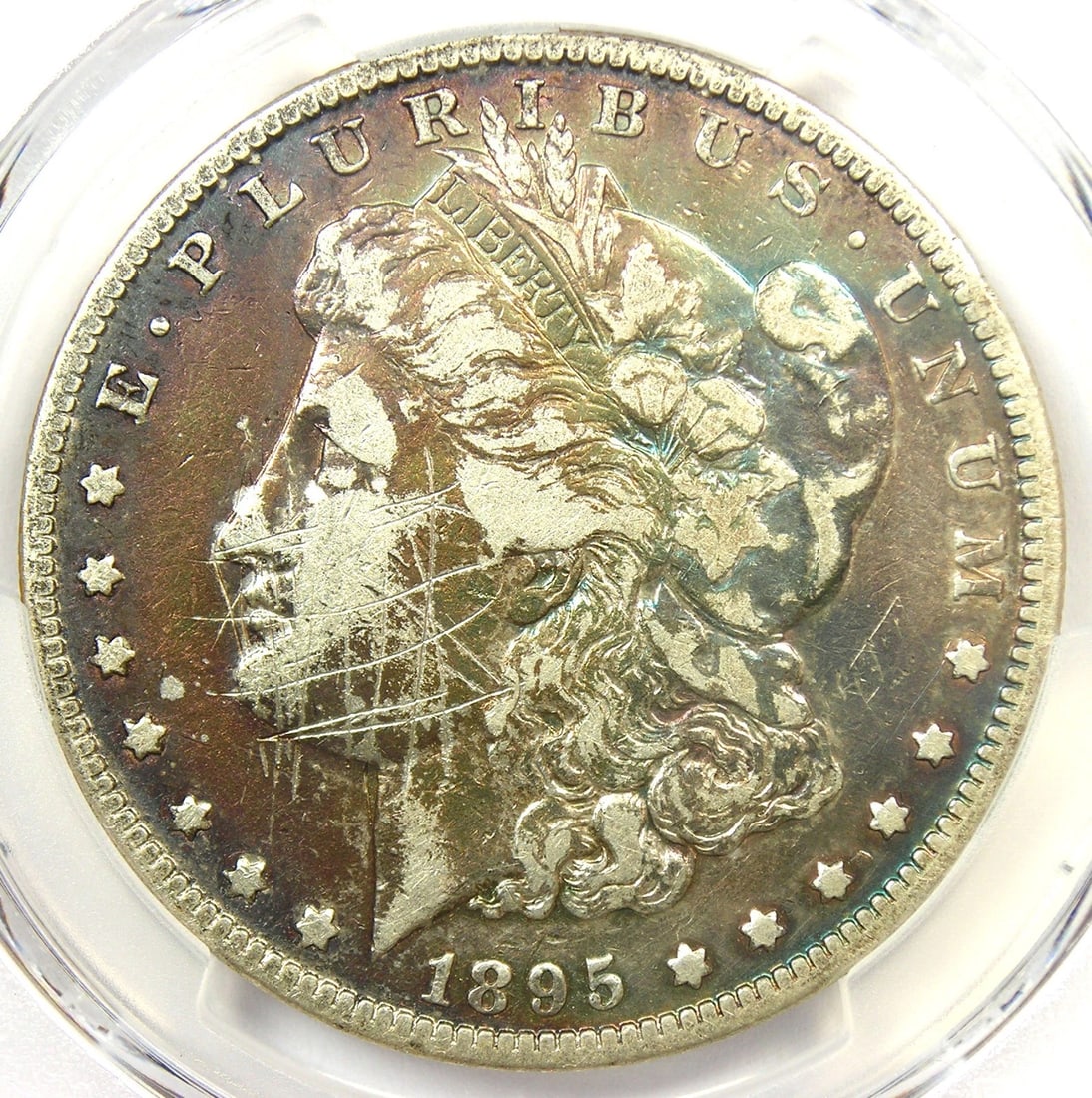 1895-O MORGAN SILVER DOLLAR $1: 1895-O Morgan Silver Dollar $1 Year: 1895 Denomination: $1 Country of Origin: United States Accessories: None Accessories Notice: When purchasing pre-owned goods, please refer to the photos of the ite