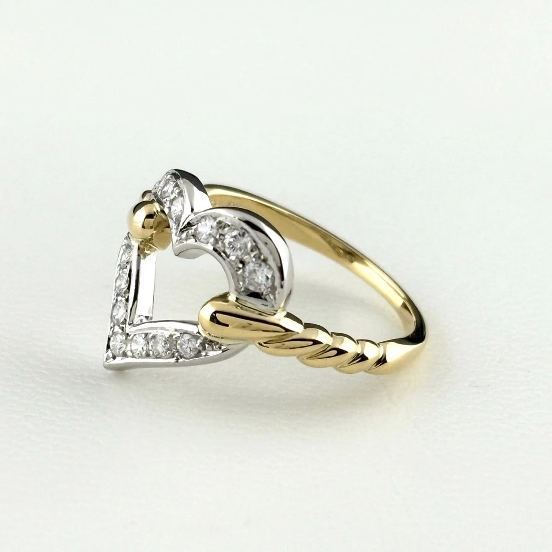 MIKIMOTO HEART MOTIF RING YELLOWGOLD PLATINUM: MIKIMOTO Heart motif Ring YellowGold Platinum Brand: MIKIMOTO Type/Style: Ring Material: 18K YG Pt950, Color: none Size: US 5.5 Accessories: None Accessories Notice: When purchasing pre-ow