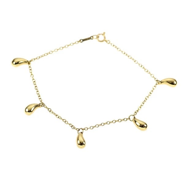 TIFFANY & CO K18YG BRACELET TEARDROP SPRING RING: Tiffany & Co K18YG bracelet Teardrop spring ring Brand: Tiffany Type/Style: bracelets Material: K18YG, Color: YG Size: 6.75 - 7 US Accessories: None Accessories Notice: When purchasing pre-owned
