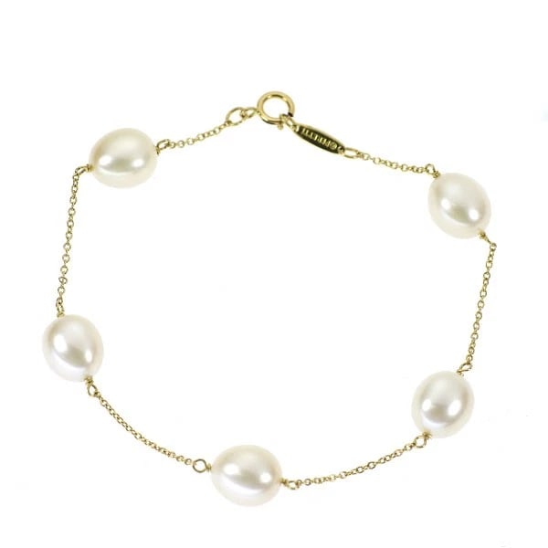 TIFFANY & CO K18YG FRESHWATER PEARL BRACELET: Tiffany & Co K18YG freshwater pearl bracelet Brand: Tiffany Type/Style: bracelets Material: K18YG, Color: YG Size: 6.75 - 7 US Accessories: None Accessories Notice: When purchasing pre-own
