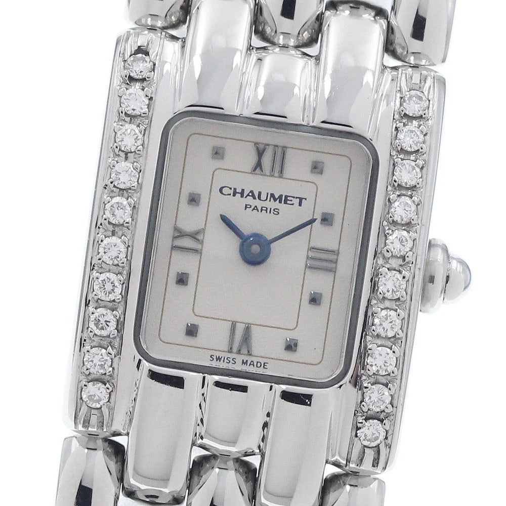 CHAUMET DIAMOND BEZEL BEIGE QUARTZ WATCH: Chaumet diamond bezel beige Quartz Watch Brand: Chaumet Type/Style: Wristwatch Material: Band Material Stainless Steel, Case Material Stainless Steel Color: Case Color Silver Band Color Silver Dial