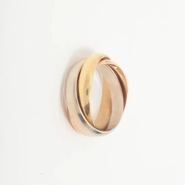 CARTIER TRINITY RING 750: Cartier Trinity Ring 750 Brand: Cartier Type/Style: Ring Material: 750(YGxPGxWG), Color: YG?PG?WG Size: 4.5 - 4.75 US Accessories: None Accessories Notice: When purchasing pre-owned goods, please
