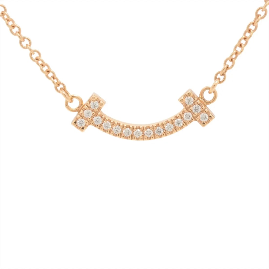 TIFFANY T SMILE MINI DIAMOND NECKLACE 750(PG): Tiffany T Smile Mini diamond Necklace 750(PG) Brand: Tiffany Type/Style: Necklace Material: 750(PG), Color: Pink Gold Size: Size(CM) Chain length:46.3 Accessories: None Accessories Notice: When
