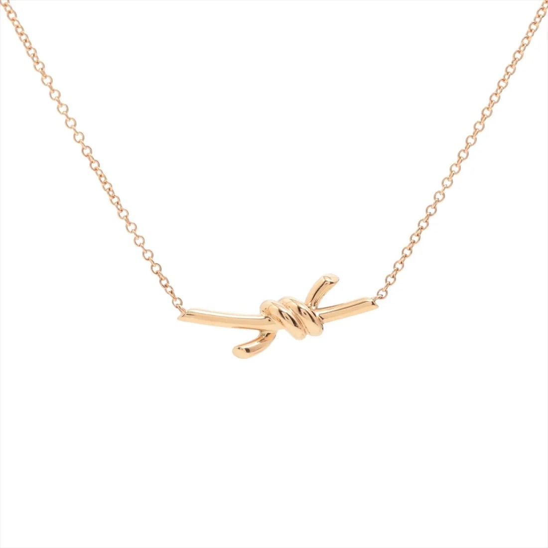 TIFFANY KNOT NECKLACE 750(PG): Tiffany Knot Necklace 750(PG) Brand: Tiffany Type/Style: Necklace Material: 750(PG), Color: Pink Gold Size: Size(CM) Chain length:43.2 Accessories: None Accessories Notice: When purchasing pre-owned