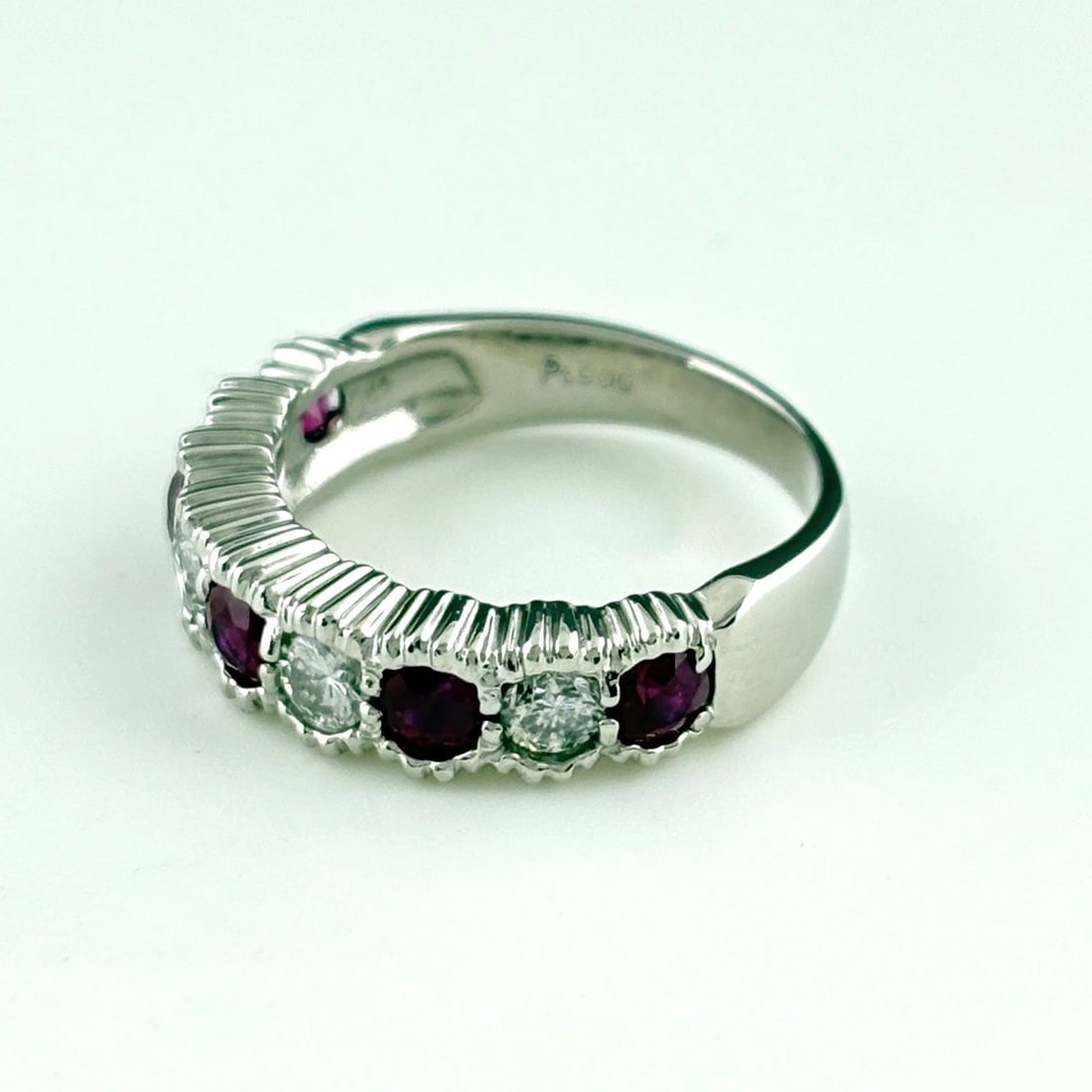RUBY DESIGN PLATINUM MELEE DIAMOND RING: ruby design Platinum melee diamond Ring Brand: Unbranded Type/Style: Ring Material: Pt900, Main Stone Ruby Color: PT Size: US 5 Accessories: None Accessories Notice: When purchasing pre-ow