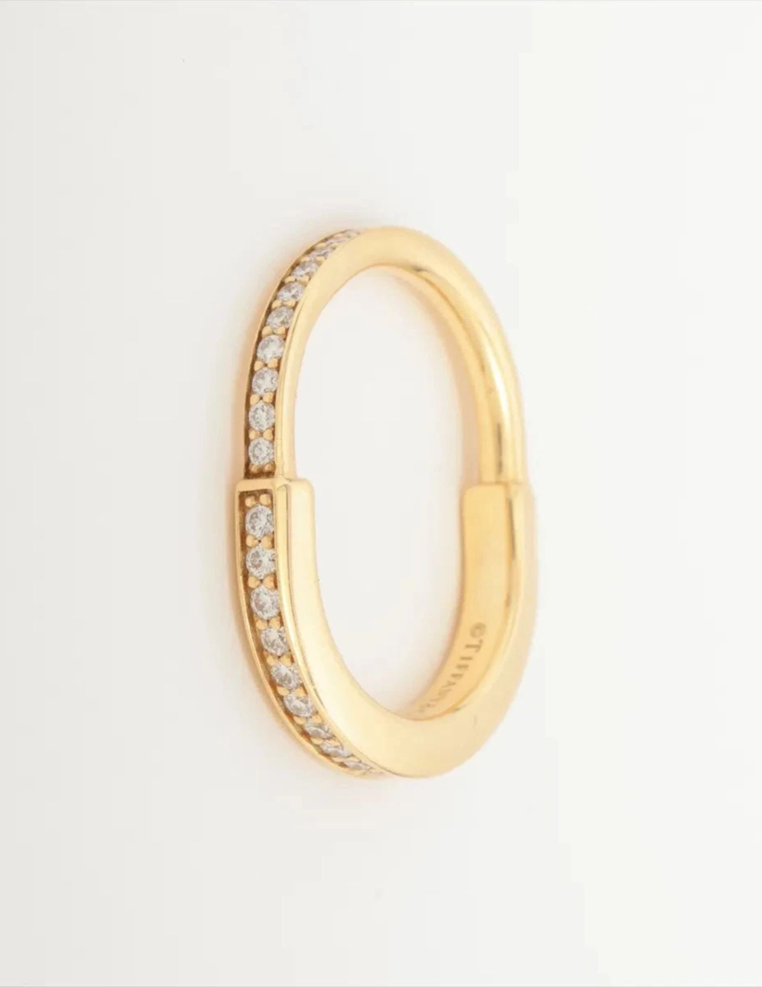TIFFANY LOCK DIAMOND RING 750(YG): Tiffany Lock diamond Ring 750(YG) Brand: Tiffany Type/Style: Ring Material: 750(YG), Color: yellow Gold Size: 5.25 US Accessories: None Accessories Notice: When purchasing pre-owned goods, please