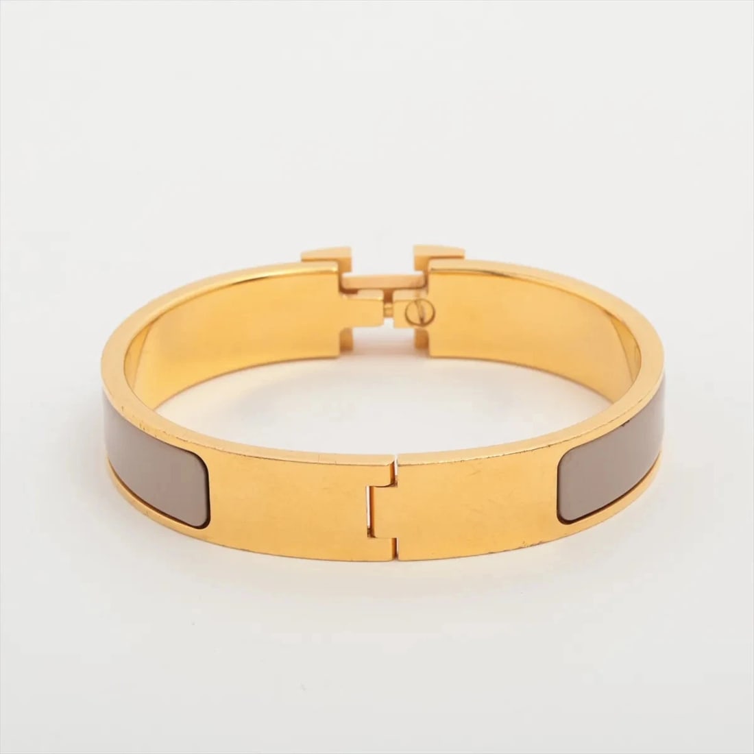 HERMES BANGLE GP GOLD X MARRON GLACE: Hermes Bangle GP Gold x marron glace Brand: Hermes Type/Style: Bracelet Material: GP, Color: Gold x marron glace Size: Size(CM) Bracelet length:15.5 Accessories: None Accessories Notice: W