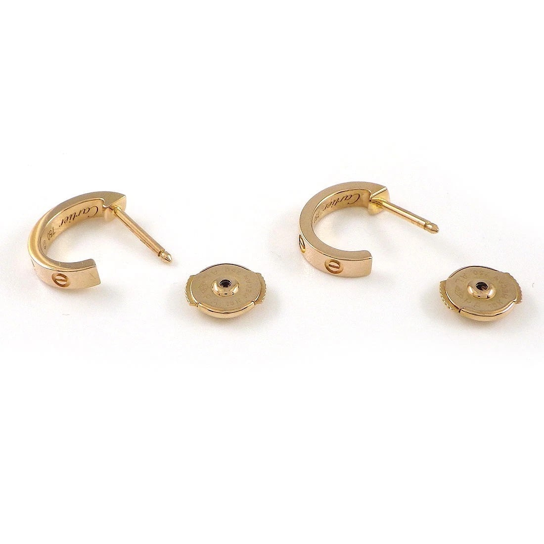 CARTIER PIERCED EARRINGS 750 ROSE GOLD: Cartier Pierced Earrings 750 Rose Gold Brand: Cartier Type/Style: Earrings Material: 750(18K) Rose(Pink) Gold, Color: Rose(Pink) Gold Size: W 0.10" x H 0.50"(inches) / W 2.7mm x H 12.8mm Hoop Diameter