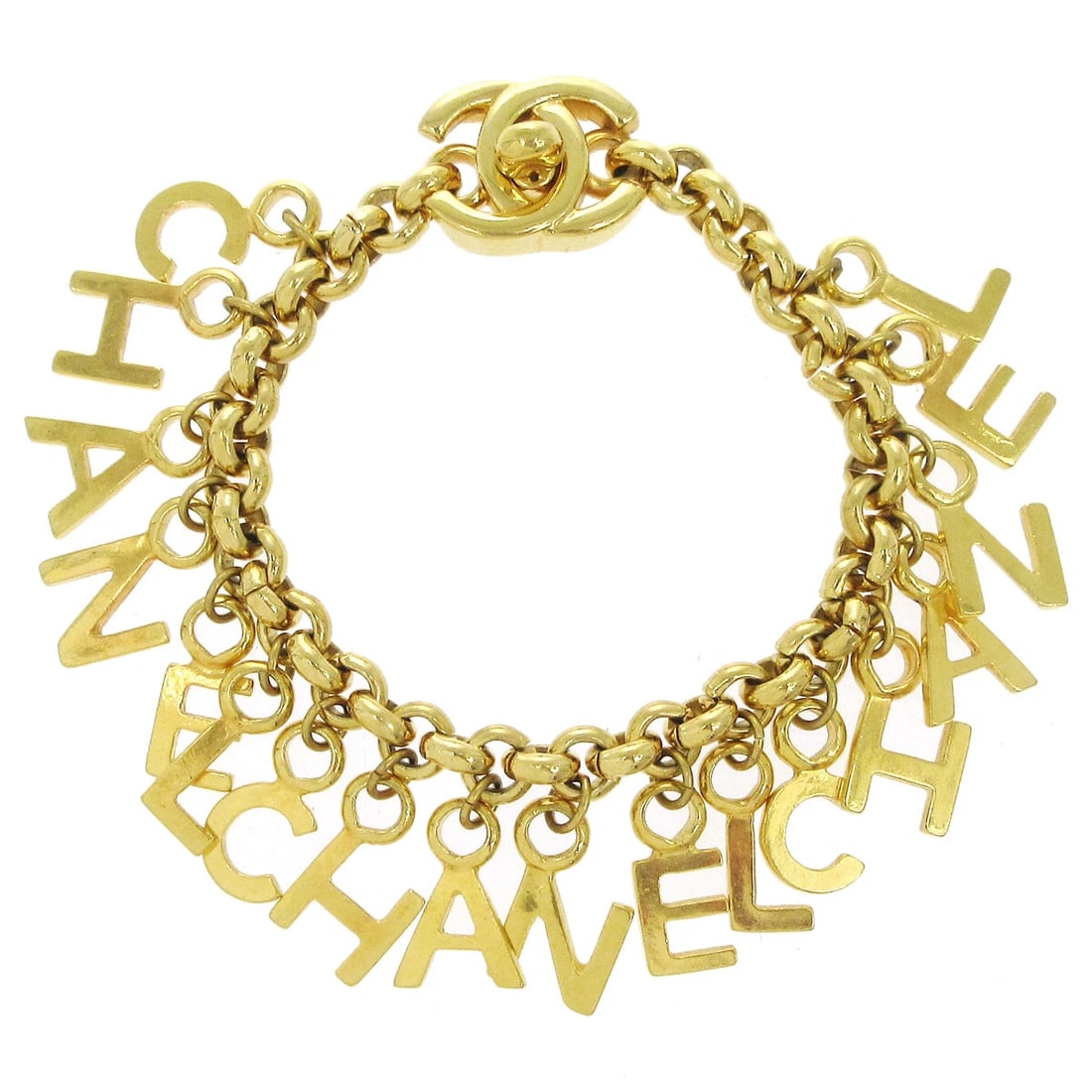 CHANEL TURNLOCK GOLD CHAIN BRACELET: Chanel Turnlock Gold Chain Bracelet Brand: Chanel Type/Style: Bracelet Material: Gold-tone, Color: Gold Size: Inner circumference : 19.0 cm Charm(CC) : W 2.0 x H 1.7 cm Accessories: None A