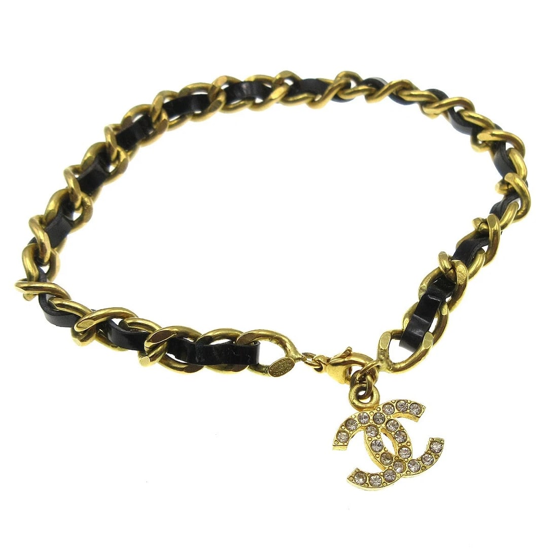CHANEL CHARM RHINESTONE ANKLET GOLD PATENT LEATHER: Chanel Charm Rhinestone Anklet Gold Patent Leather Brand: CHANEL Type/Style: Anklet Material: Gold-plated, Patent Leather, Color: Gold, Black Size: Inner circumference : 23.5 cm Charm : W 1.5 x H 1.3
