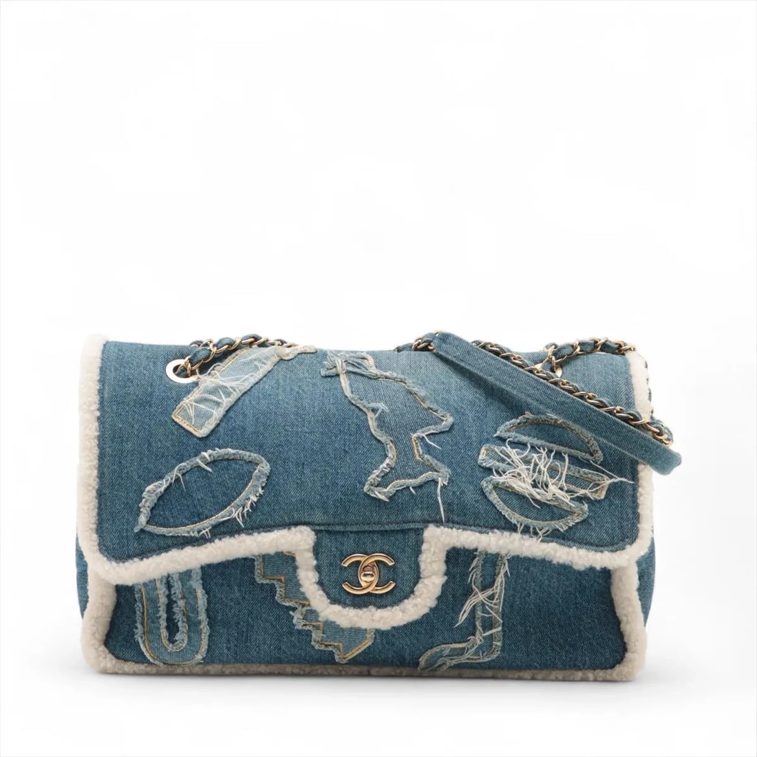 CHANEL EGYPT LINE DENIM X SHEEPSKIN FLAP DOUBLE CHAIN BAG: Chanel Egypt line denim x sheepskin Flap Double Chain Bag Brand: Chanel Type/Style: Shoulder Bag Material: Denim ? Mouton Color: Blue Size: Height:8.7inchLength:14.2inchDepth:3.9inch Accessories: