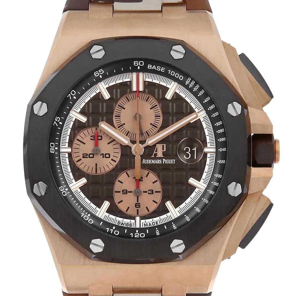 AUDEMARS PIGUET ROYAL OAK CHRONOGRAPH WATCH: AUDEMARS PIGUET Royal Oak Chronograph Watch Brand: AUDEMARS PIGUET Type/Style: Wrist watch Material: Band Material rubber, Case Material Pink Gold Color: Dial Color Brown Size: Case:W44mm Accessor