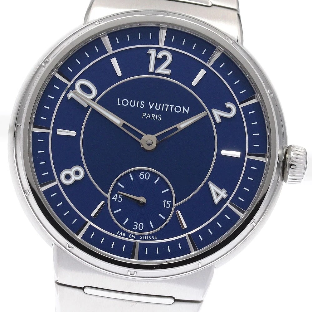 LOUIS VUITTON TAMBOUR STEEL BLUE AUTOMATIC WATCH: LOUIS VUITTON Tambour Steel Blue Automatic Watch Brand: LOUIS VUITTON Type/Style: Wristwatch Material: Band Material Stainless Steel, Case Material Stainless Steel Color: Case Color Silver Band Color 