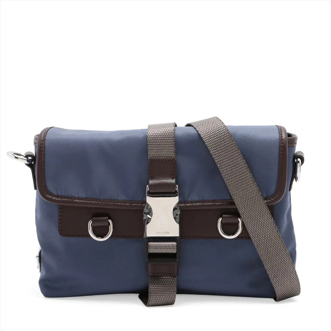 PRADA TESUTO X VITTELLO NYLON & LEATHER SHOULDER BAG: Prada Tesuto x Vittello Nylon & Leather Shoulder bag Brand: Prada Type/Style: Shoulder Bag Material: Nylon & Leather Color: blue x brown Size: Height:5.5inchLength:7.5inchDepth:2.0inch Accessories