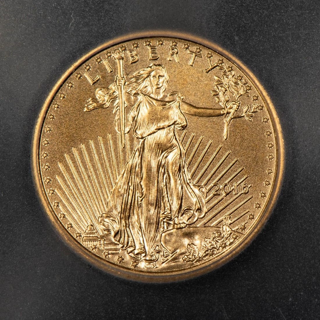 2016 G$5 1/10 OZ GOLD AMERICAN EAGLE: 2016 G$5 1/10 oz Gold American Eagle Brand/Mint: U.S. Mint Year: 2016 Fineness: 0.9167 Country of Origin: United States Accessories: None Accessories Notice: When purchasing pre-owned goods, please