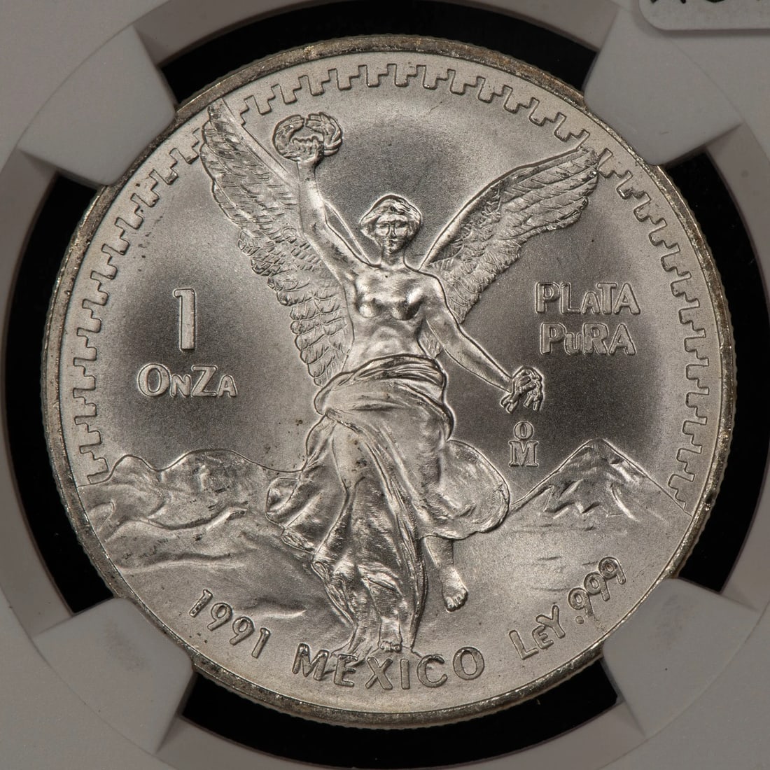 1991-MO MEXICO 1 OZ SILVER LIBERTAD - TYPE 2 SMALL ONZA: 1991-Mo Mexico 1 oz Silver Libertad - Type 2 Small OnZa Brand/Mint: Mexican Mint Year: 1991 Fineness: 0.999 Country of Origin: Mexico Accessories: None Accessories Notice: When purchasing pre-owned