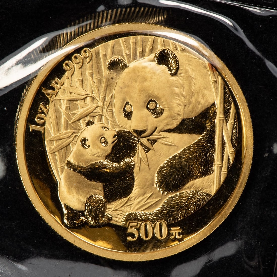 2005 500 YUAN CHINA 1 OZ GOLD PANDA COIN: 2005 500 Yuan China 1 oz Gold Panda Coin Brand/Mint: Chinese Mint Year: 2005 Fineness: 0.999 Country of Origin: China Accessories: None Accessories Notice: When purchasing pre-owned goods, please r