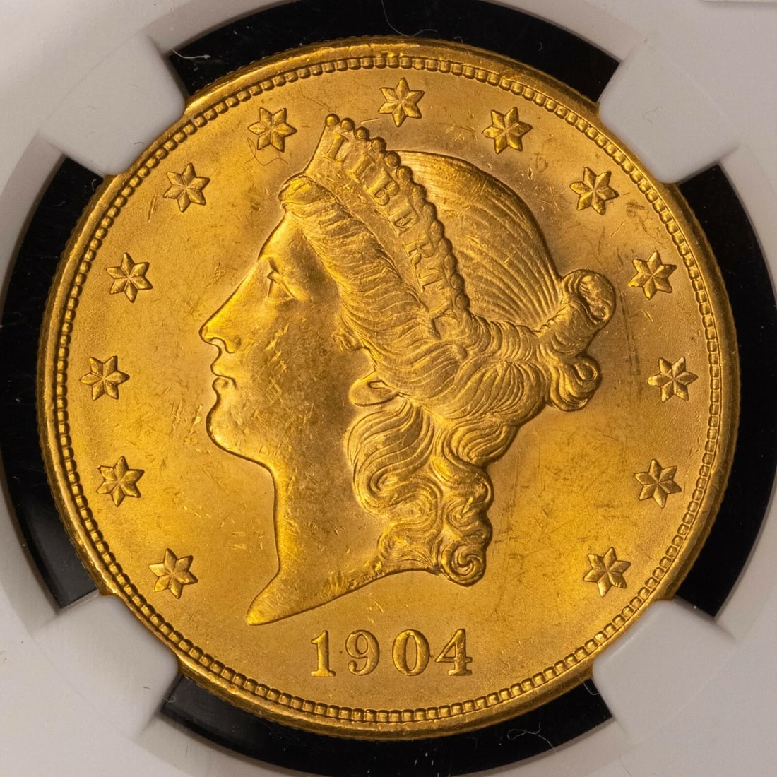 1904 G$20 LIBERTY HEAD GOLD DOUBLE EAGLE COIN: 1904 G$20 Liberty Head Gold Double Eagle Coin Brand/Mint: U.S. Mint Year: 1904 Fineness: 0.9 Country of Origin: United States Accessories: None Accessories Notice: When purchasing pre-owned goods,