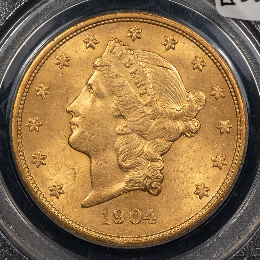 1904 $20 LIBERTY HEAD GOLD DOUBLE EAGLE: 1904 $20 Liberty Head Gold Double Eagle Brand/Mint: U.S. Mint Year: 1904 Fineness: 0.9 Country of Origin: United States Accessories: None Accessories Notice: When purchasing pre-owned goods, please