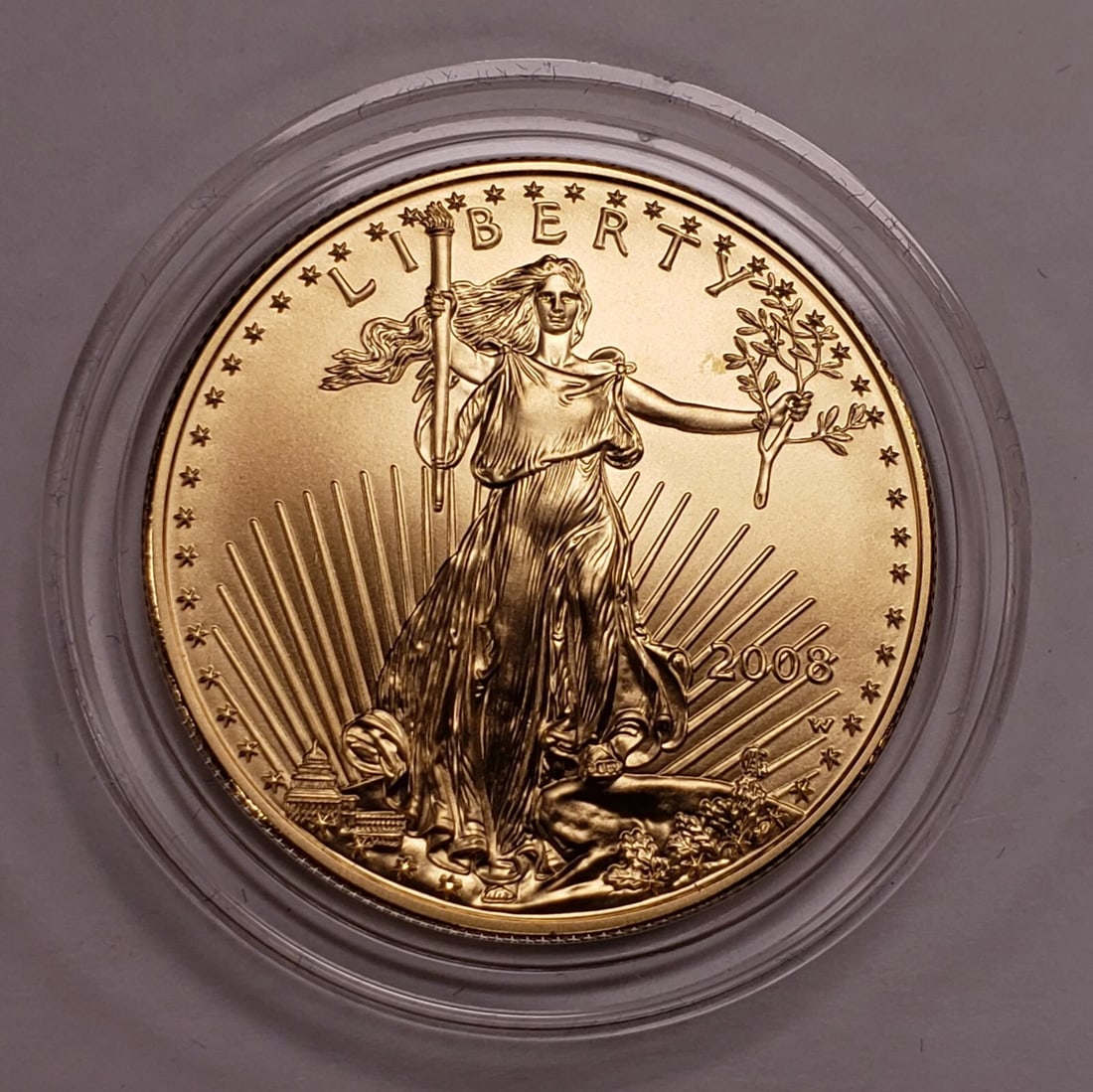 2008 G$50 1 OZ GOLD AMERICAN EAGLE BURNISHED COIN: 2008 G$50 1 oz Gold American Eagle Burnished Coin Brand/Mint: U.S. Mint Year: 2008 Fineness: 0.9167 Country of Origin: United States Accessories: None Accessories Notice: When purchasing pre-owned