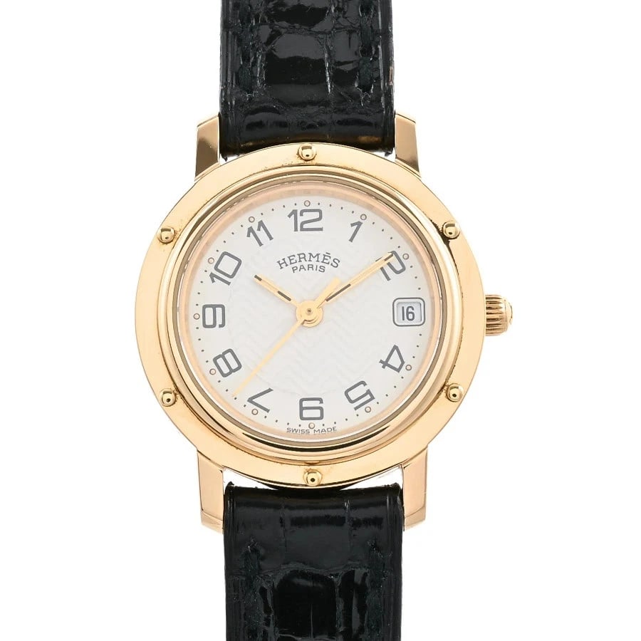HERMES WHITE QUARTZ WATCH: Hermes White Quartz Watch Brand: HERMES Type/Style: Wristwatch Material: Band Material Yellow Gold/Leather Strap Case Material N/A Color: Dial Color White Size: Case Size 24mm Accessories: None