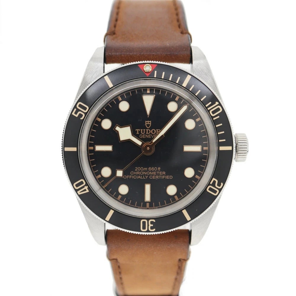 TUDOR HERITAGE BLACK WATCH: Tudor Heritage Black Watch Brand: TUDOR Type/Style: Wristwatch Material: Case Material N/A Band Material N/A Color: Dial Color Black Size: Wrist Size 19.0cm Case Size 39.0mm Accessories: None