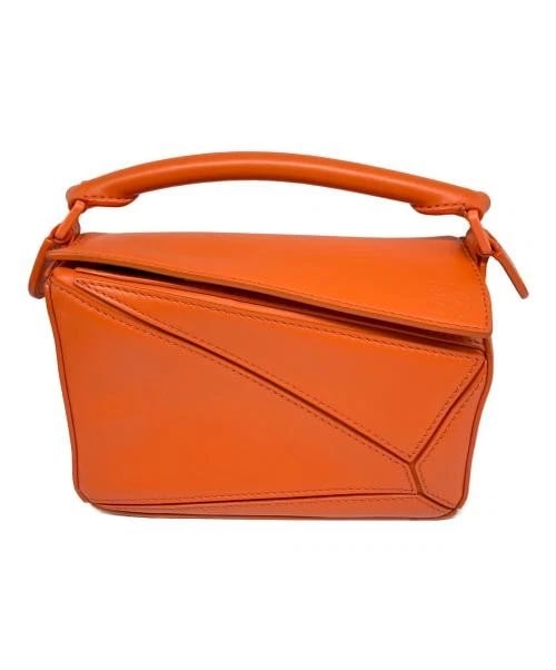 LOEWE PUZZLE BAG MINI: LOEWE Puzzle Bag Mini Brand: LOEWE Type/Style: Handbag Material: Solid Orange Color: Satin Calf Leather Size: H:10.0cm / W:17.0cm / D:7.0cm Accessories: None Accessories Notice: When purch