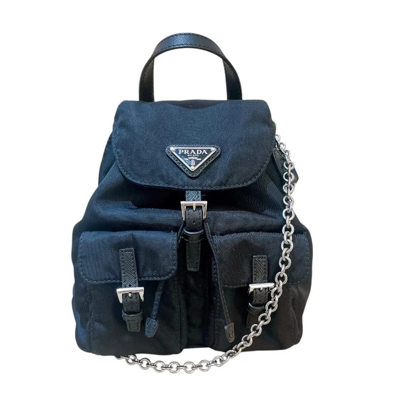 PRADA TRIANGLE LOGO BACKPACK: PRADA Triangle Logo Backpack Brand: PRADA Type/Style: Backpack Material: Nylon Color: Black / SV Hardware Size: W: 17cm / H: 20cm / D: 8cm Accessories: None Accessories Notice: When purcha