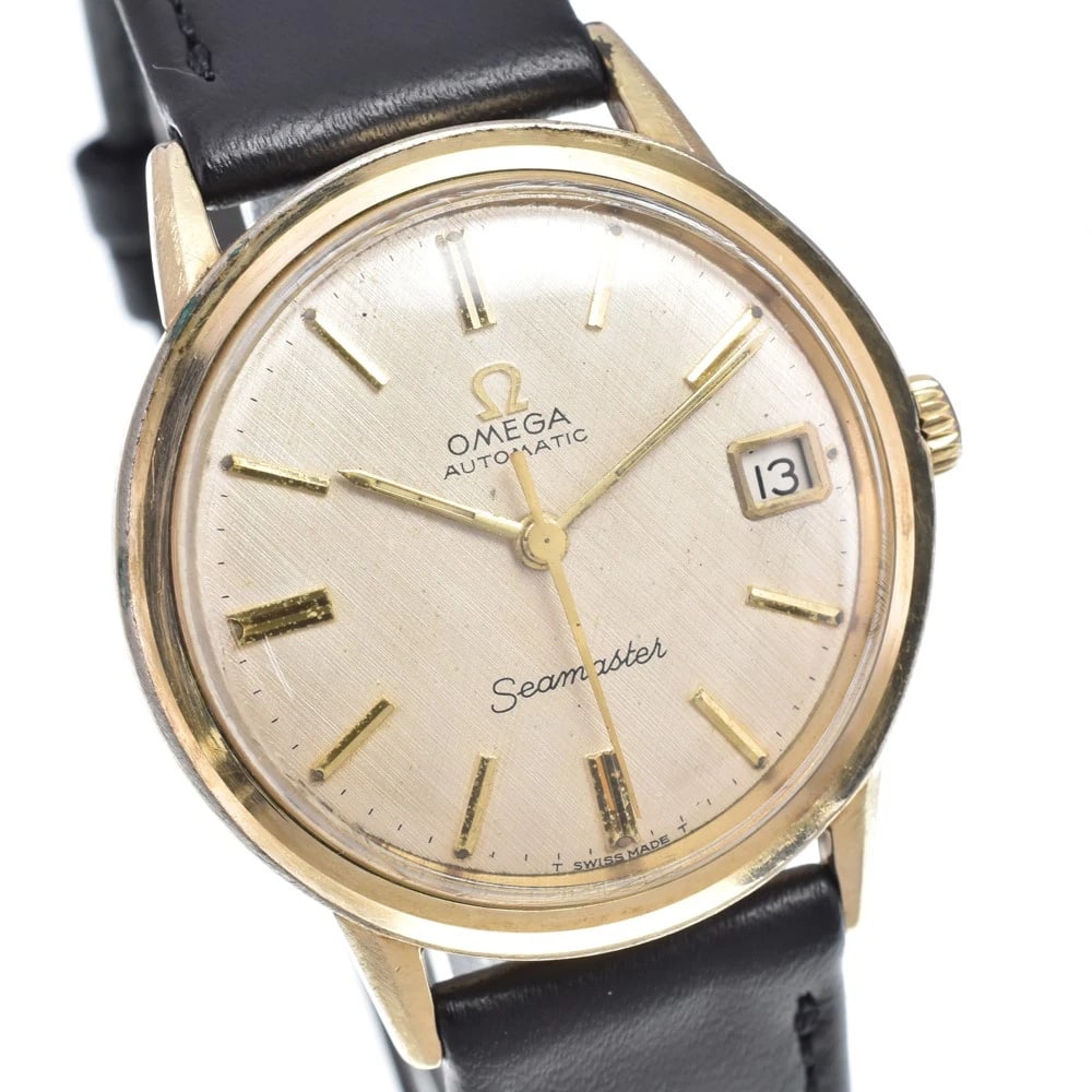 OMEGA SEAMASTER IVORY DIAL AUTOMATIC WATCH: Omega Seamaster Ivory Dial Automatic Watch Brand: OMEGA Type/Style: Wristwatch Material: Band Material leather, Case Material K14GF Color: Case Color gold, Band Color black, Dial Color Ivory Size: Cas