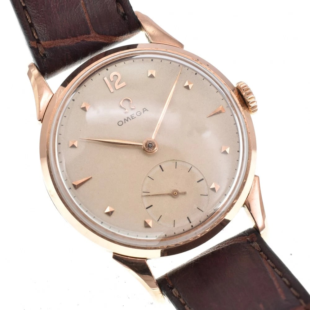 OMEGA SMALL SECOND IVORY DIAL HAND WINDING WATCH: Omega Small Second Ivory Dial Hand Winding Watch Brand: OMEGA Type/Style: Wristwatch Material: Band Material leather, Case Material K14RG Color: Case Color Rose gold, Band Color Brown, Dial Color