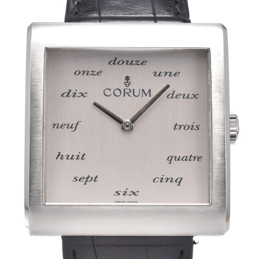 CORUM BUCKINGHAM SILVER DIAL HAND WINDING WATCH: Corum Buckingham Silver Dial Hand Winding Watch Brand: CORUM Type/Style: Wristwatch Material: Band Material leather, Case Material Stainless Steel Color: Case Color Silver, Band Color black, Dial